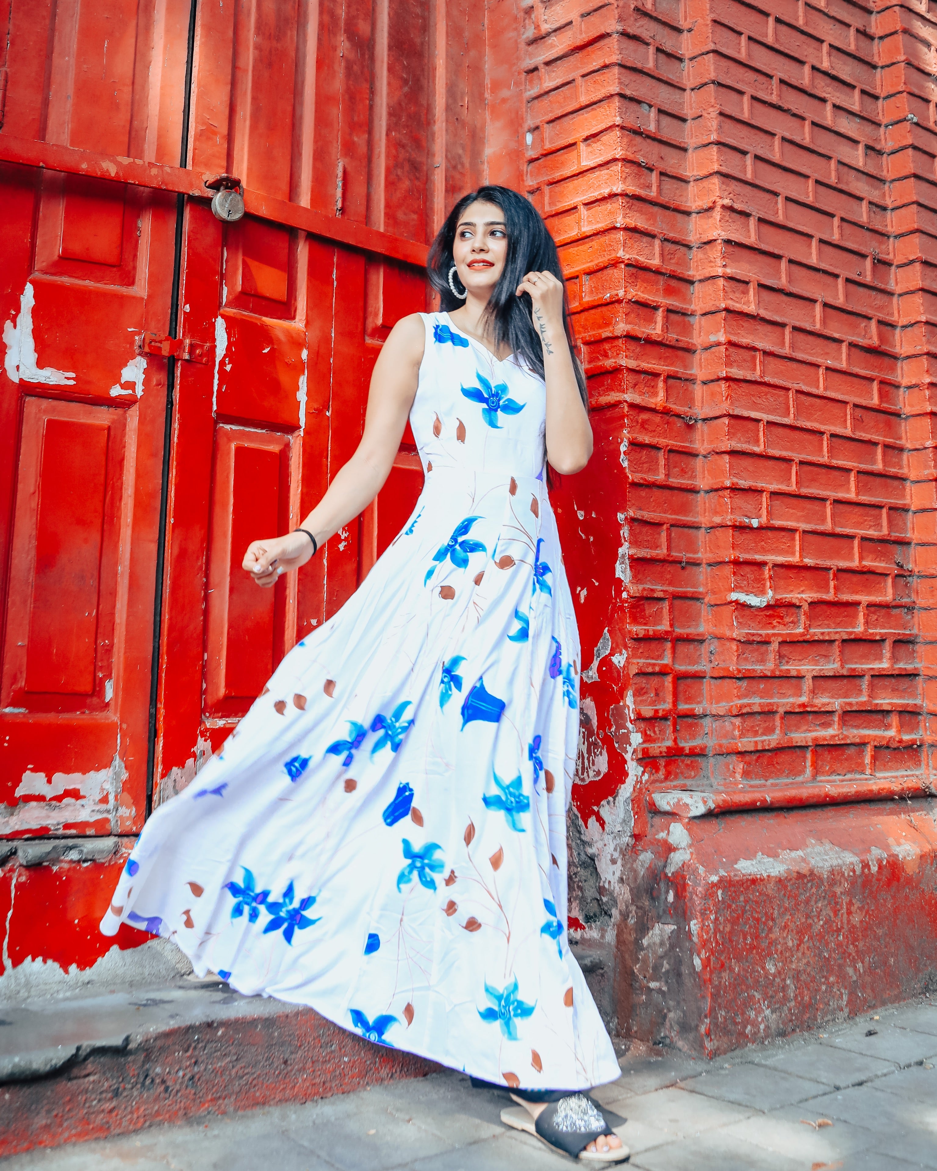 White base with blue floral handprinted dress