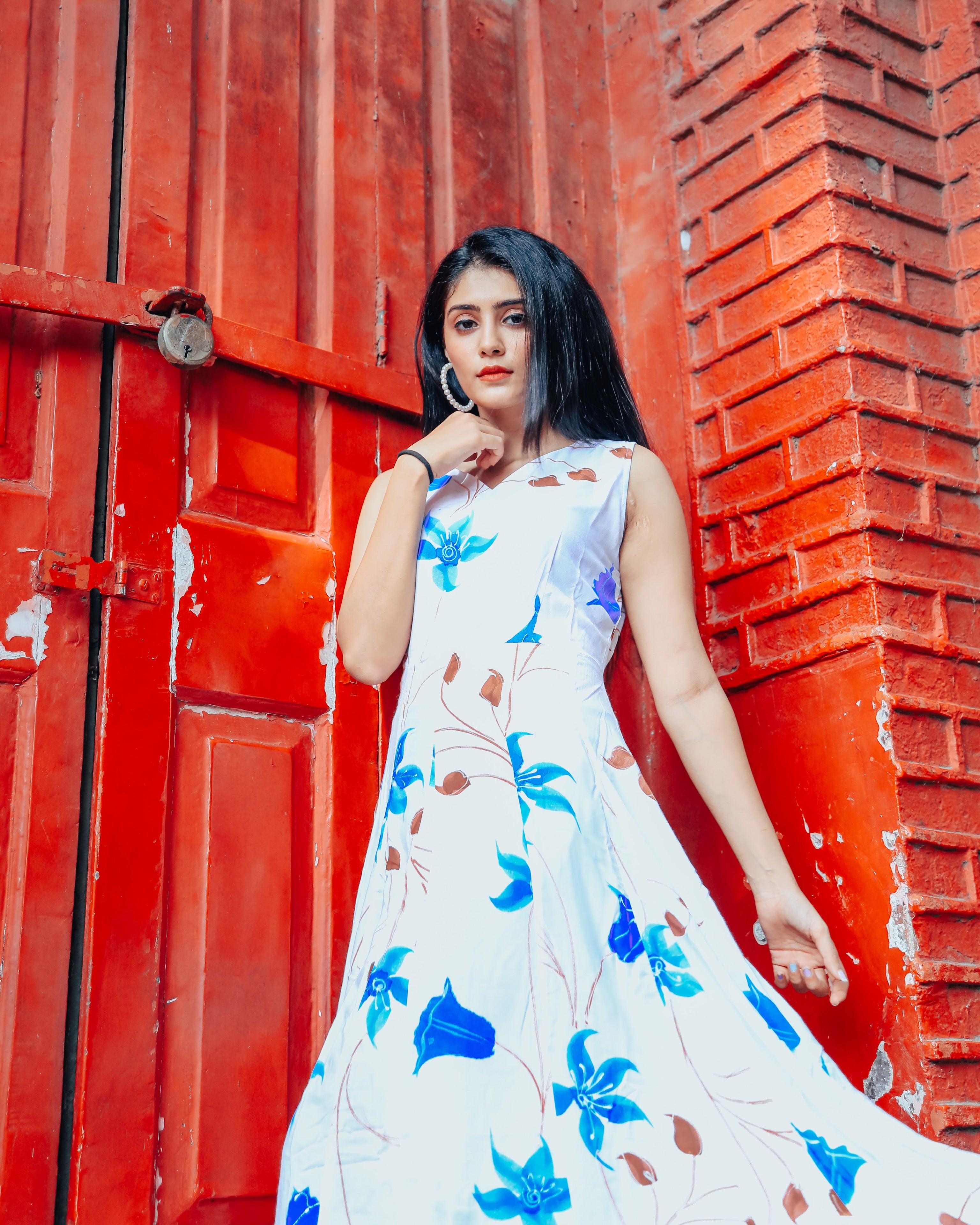 White base with blue floral handprinted dress