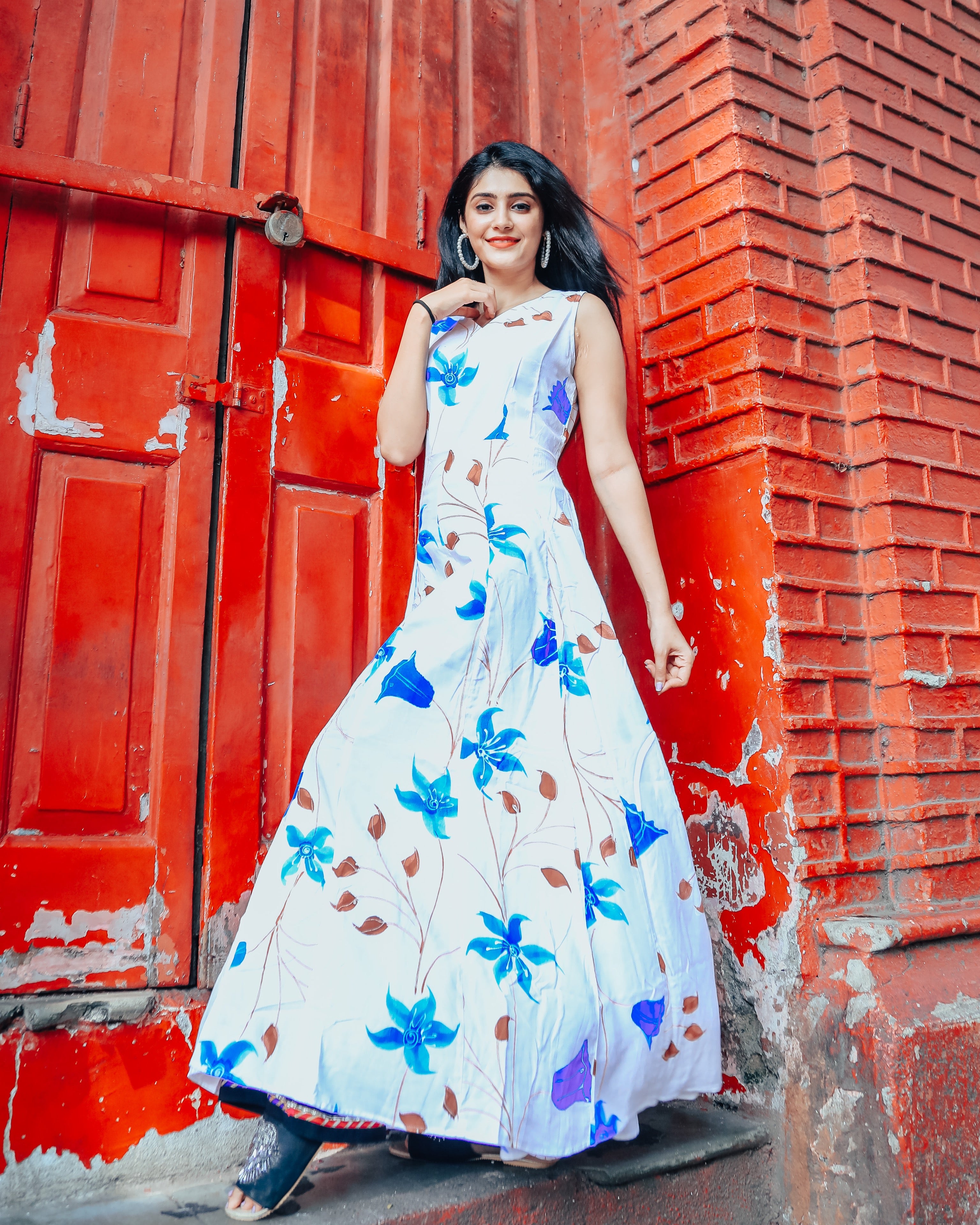 White base with blue floral handprinted dress