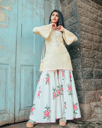 Cream hand embroidered kurta set with beautiful potli