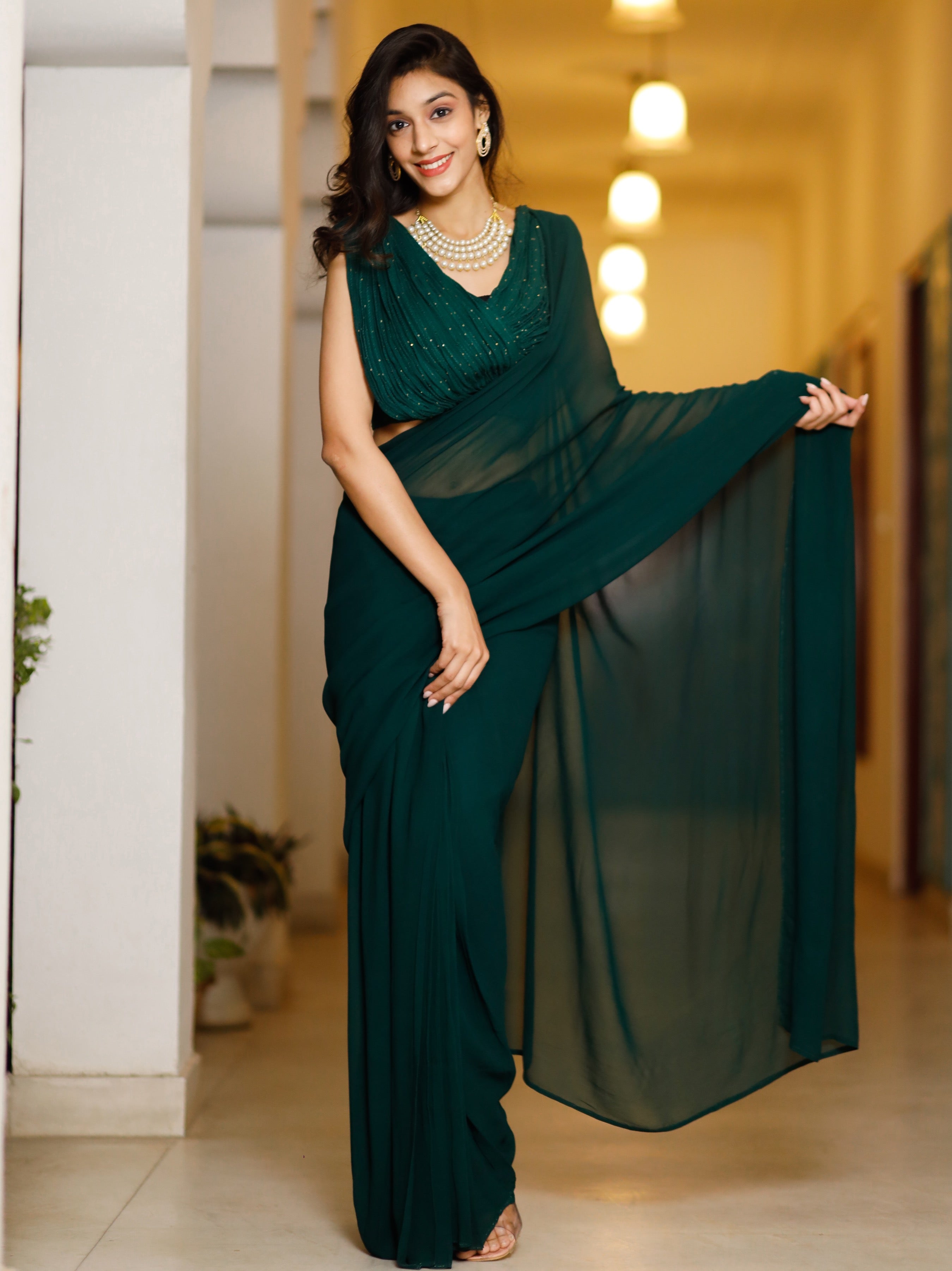 Inayaat green sequin stitched saree