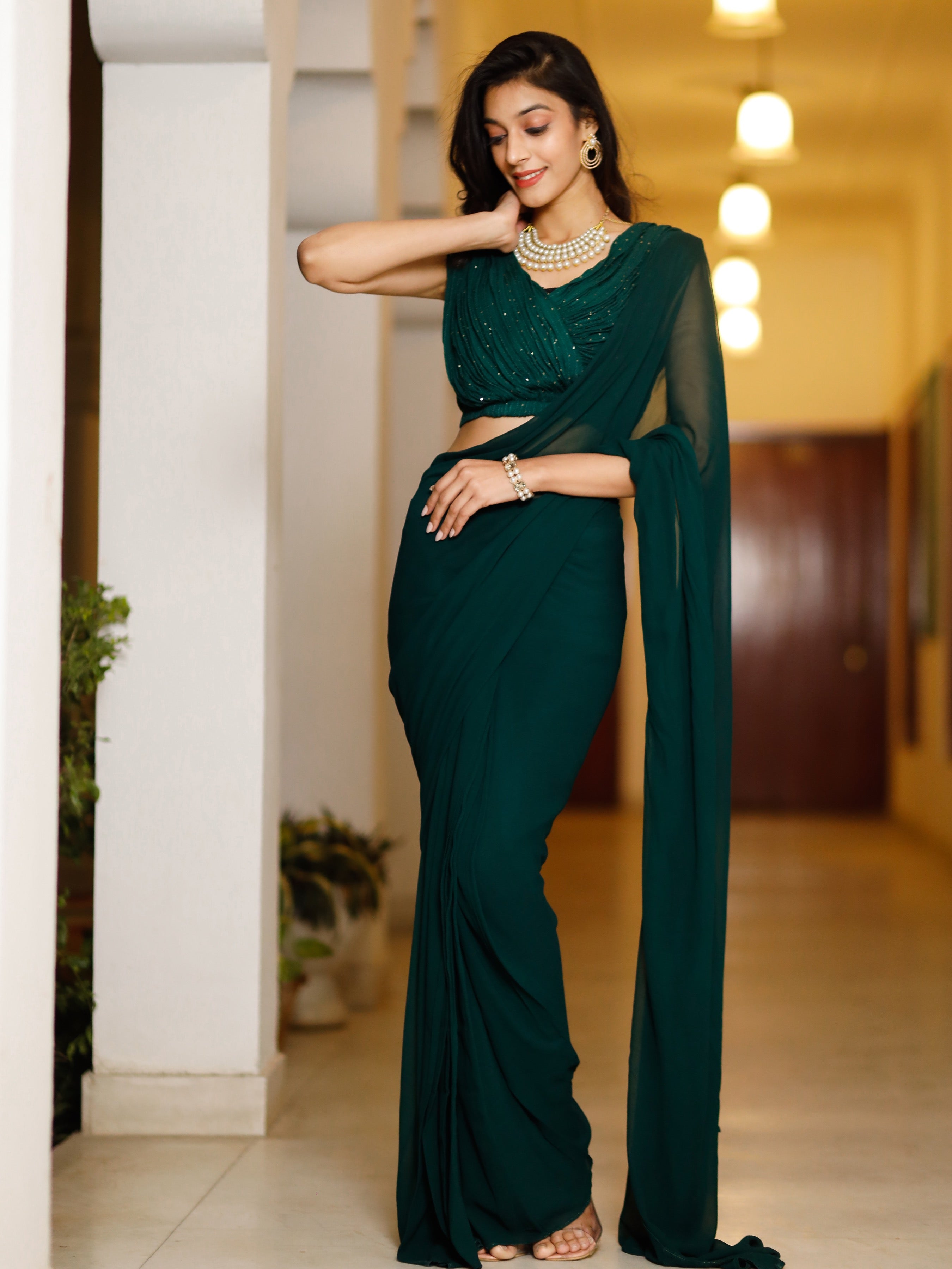 Inayaat green sequin stitched saree