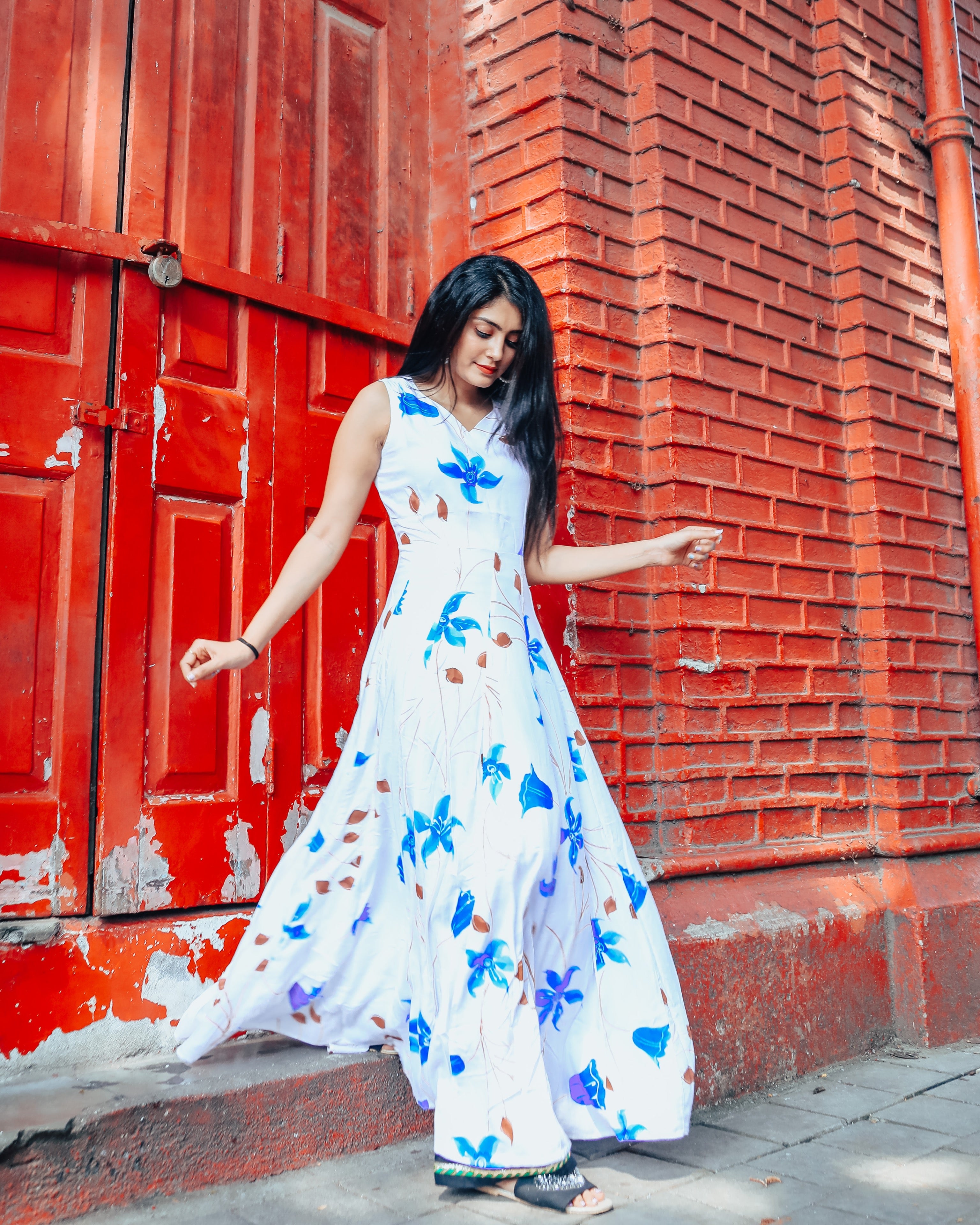 White base with blue floral handprinted dress