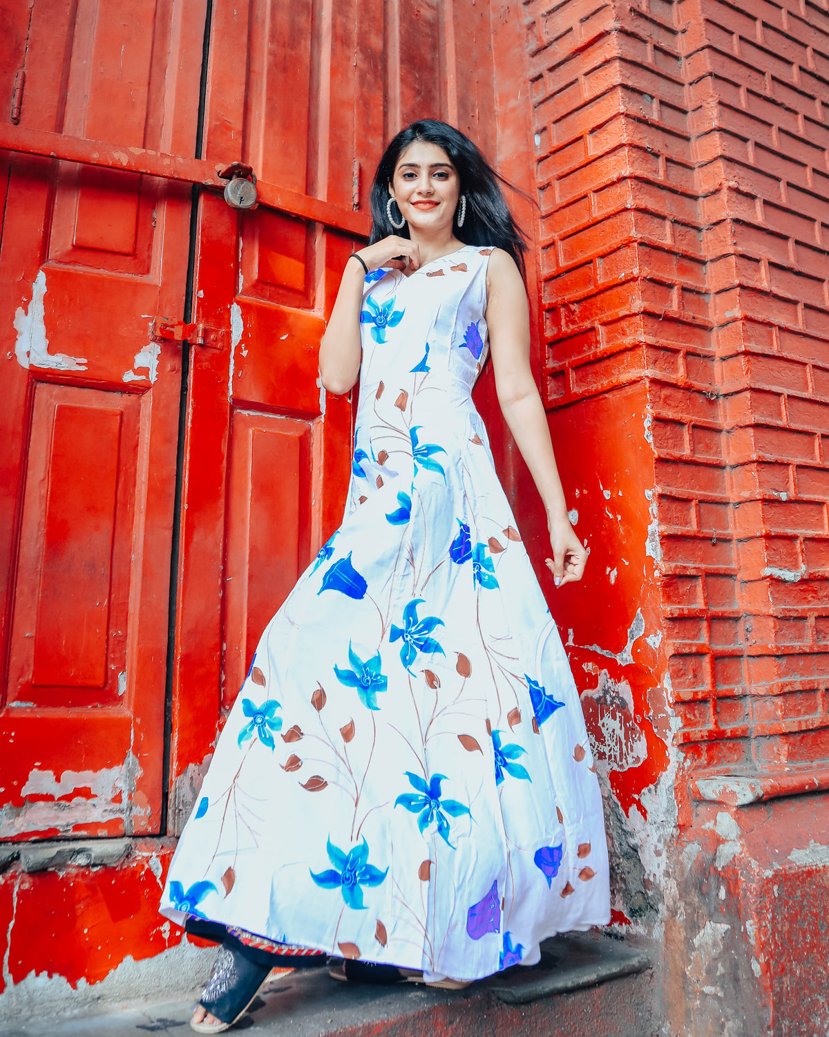 White base with blue floral handprinted dress