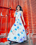 White base with blue floral handprinted dress