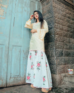 Cream hand embroidered kurta set with beautiful potli