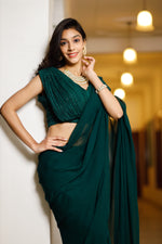 Inayaat green sequin stitched saree