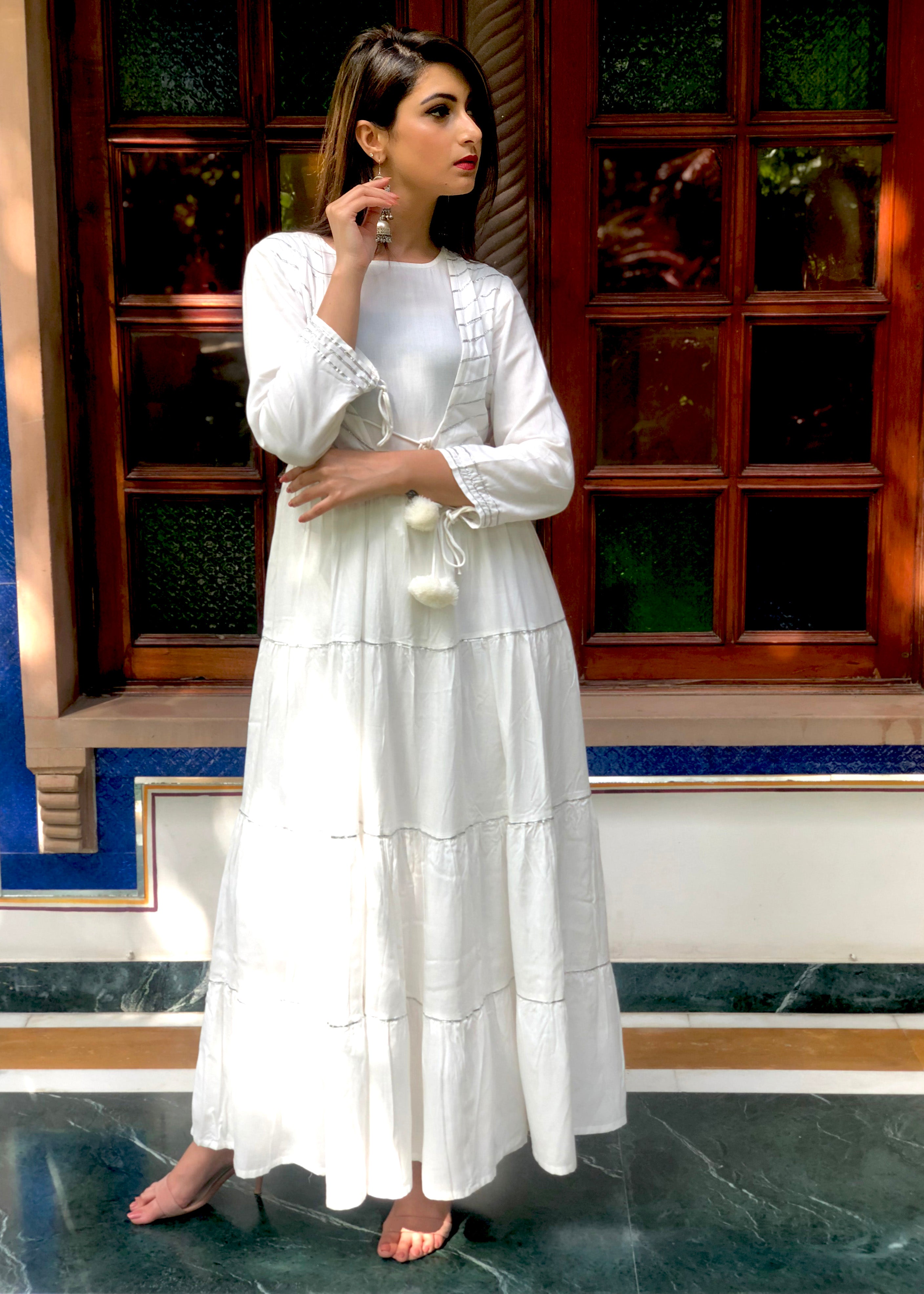 Beautiful white front tie cap dress with silver gotta work