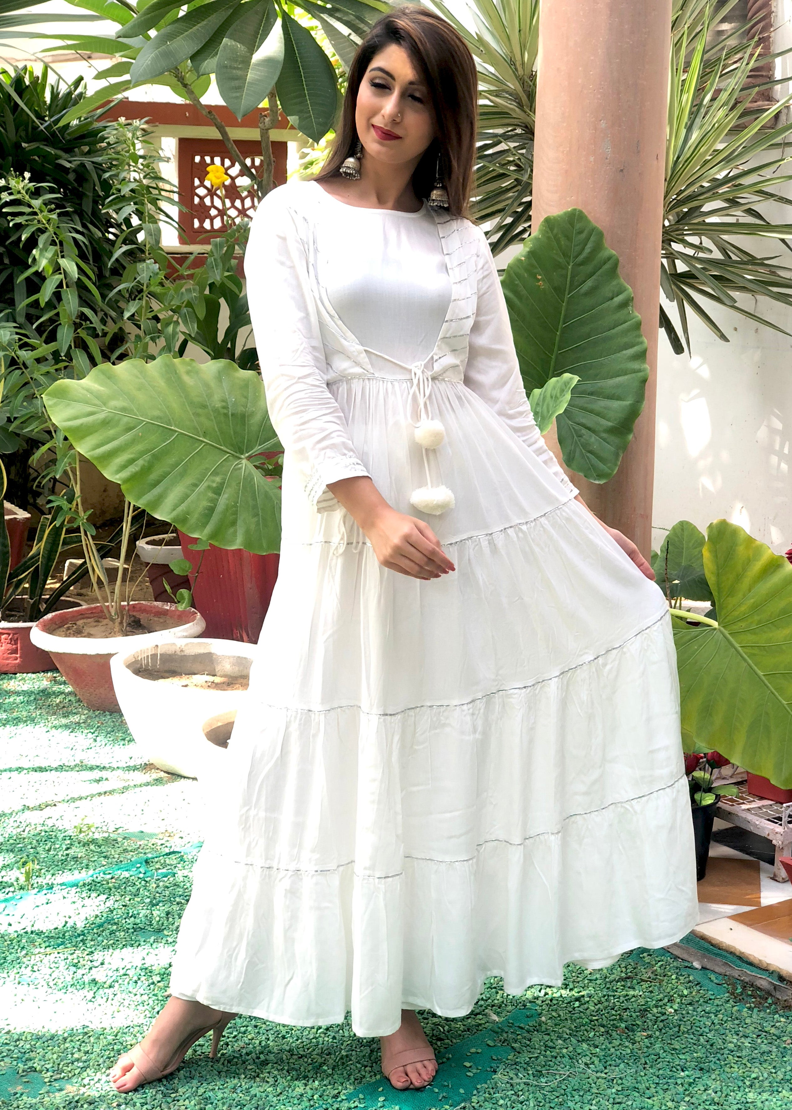 Beautiful white front tie cap dress with silver gotta work