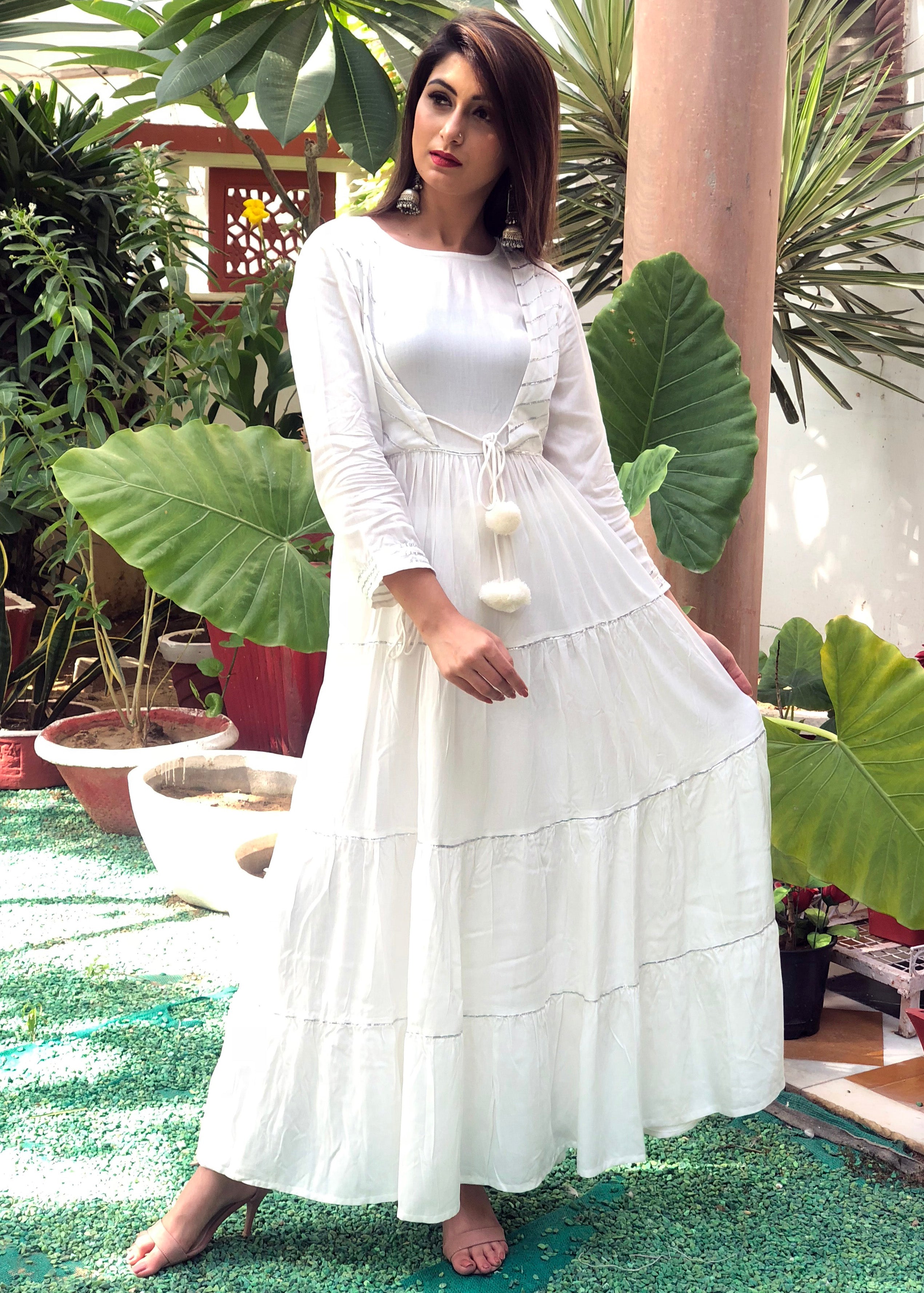 Beautiful white front tie cap dress with silver gotta work